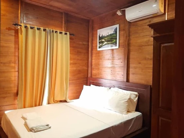 Imagen de la habitación del Hotel Grand Raka Homestay. Foto 29