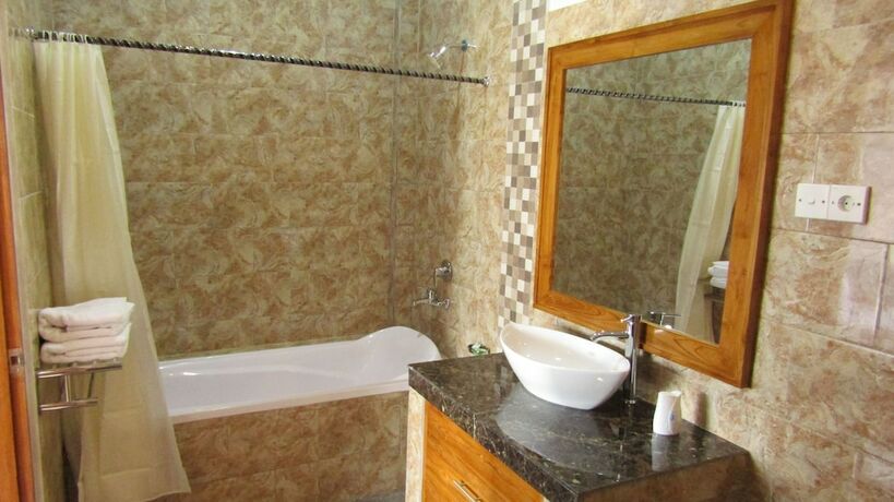 Imagen de la habitación del Hotel Grand Raka Homestay. Foto 30