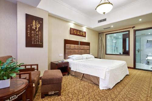 Imagen de la habitación del Hotel Grand Regency, Qingdao. Foto 9