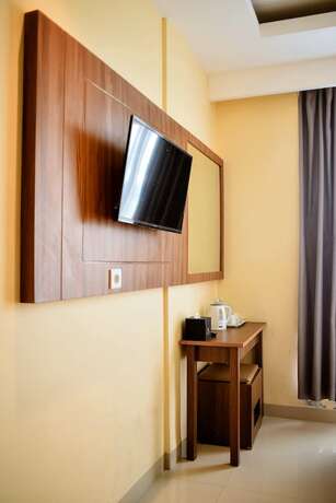 Imagen de la habitación del Hotel Grand Renggali. Foto 19