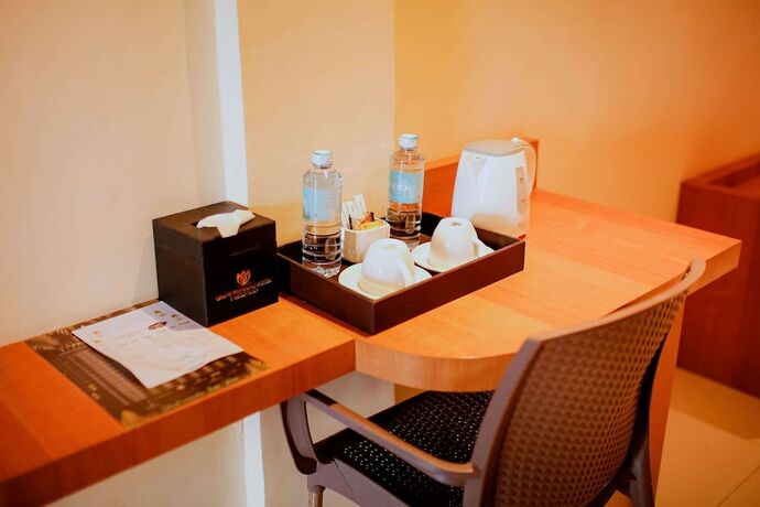 Imagen de la habitación del Hotel Grand Renggali. Foto 21
