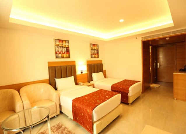 Imagen de la habitación del Hotel Grand Residence. Foto 11