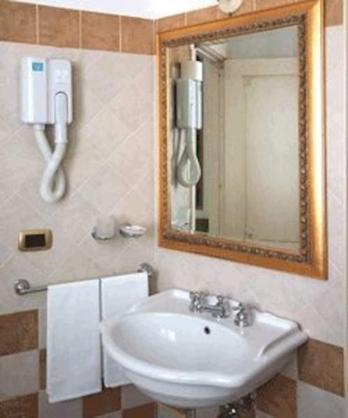 Imagen de la habitación del Hotel Grand Rinascimento. Foto 17