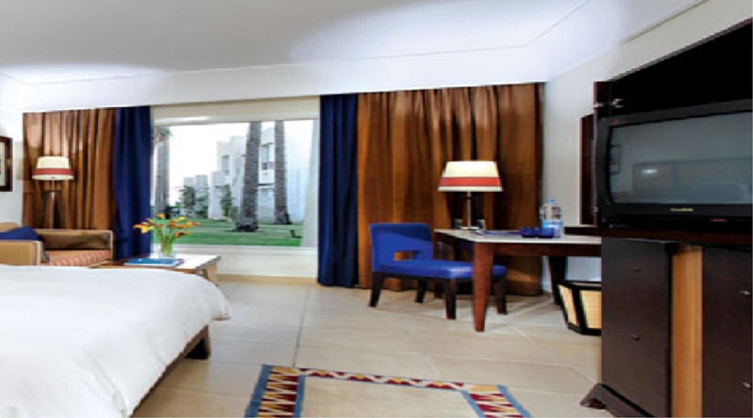 Imagen de la habitación del Hotel Grand Rotana Resort and Spa. Foto 10