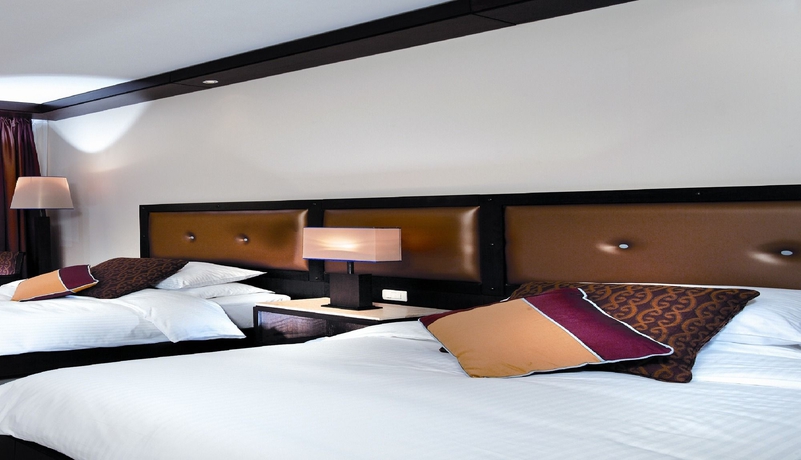 Imagen de la habitación del Hotel Grand Rotana Resort and Spa. Foto 12