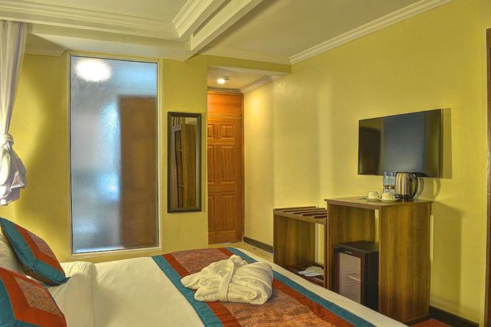 Imagen de la habitación del Hotel Grand Royal Swiss. Foto 15