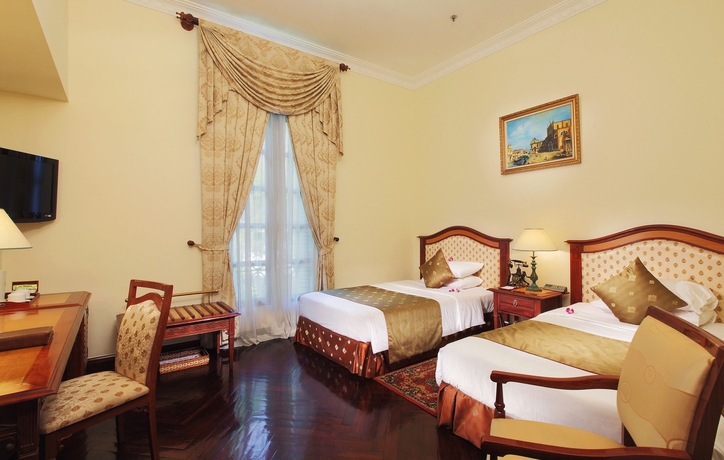 Imagen de la habitación del Hotel Grand Saigon. Foto 5