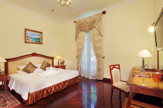 Imagen de la habitación del Hotel Grand Saigon. Foto 10