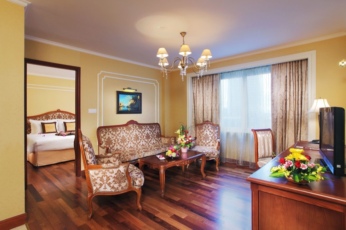 Imagen de la habitación del Hotel Grand Saigon. Foto 12