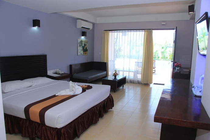 Imagen de la habitación del Hotel Grand Santhi. Foto 3