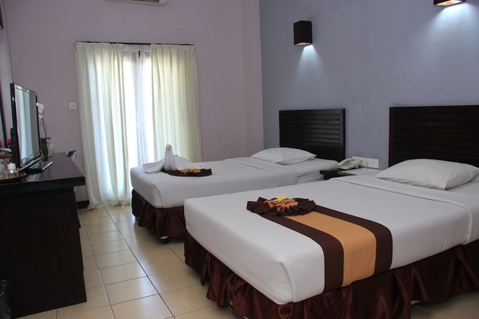 Imagen de la habitación del Hotel Grand Santhi. Foto 6