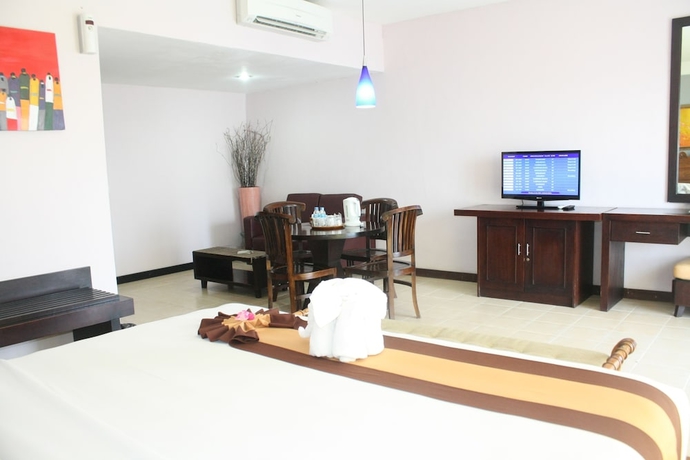 Imagen de la habitación del Hotel Grand Santhi. Foto 7