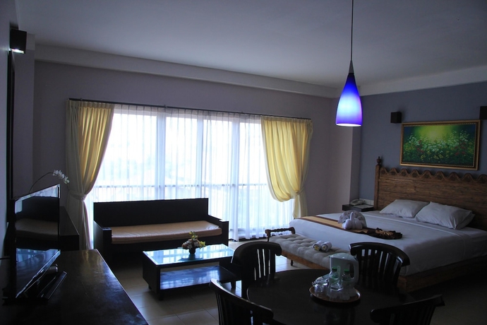 Imagen de la habitación del Hotel Grand Santhi. Foto 8