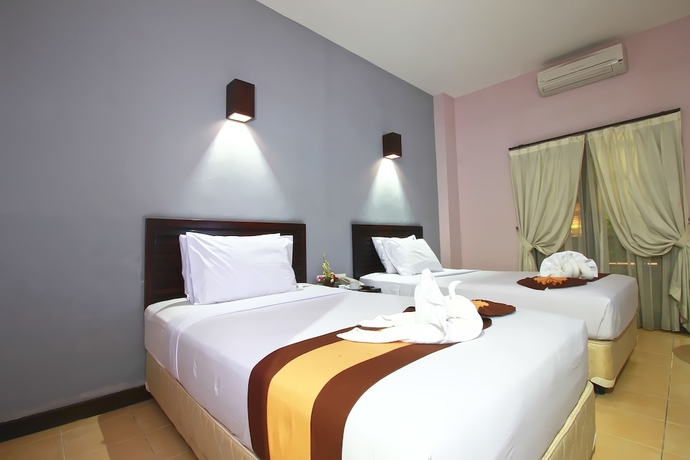 Imagen de la habitación del Hotel Grand Santhi. Foto 9