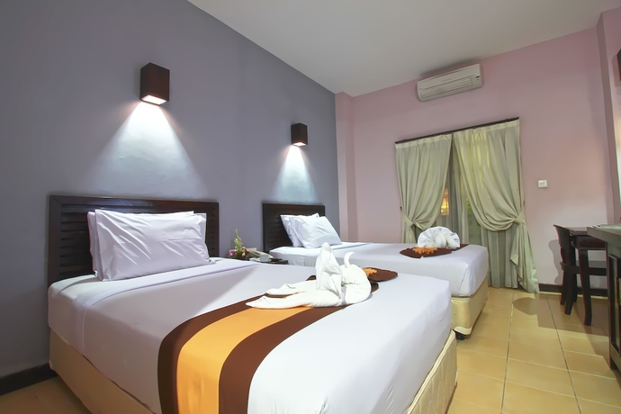 Imagen de la habitación del Hotel Grand Santhi. Foto 10