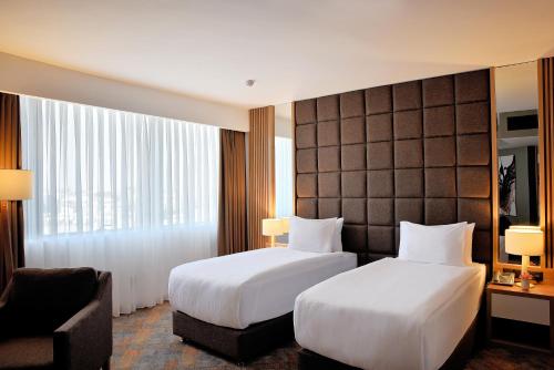 Imagen de la habitación del Hotel Grand Sapphire City. Foto 18