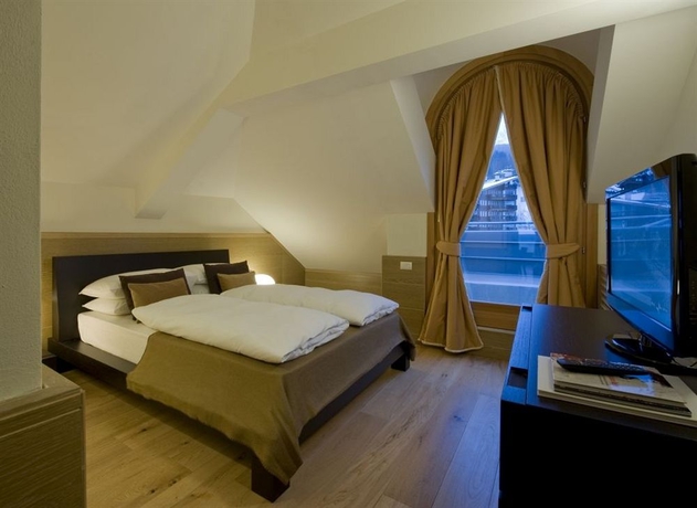 Imagen de la habitación del Hotel Grand Savoia Cortina D'ampezzo, A Radisson Collection. Foto 7
