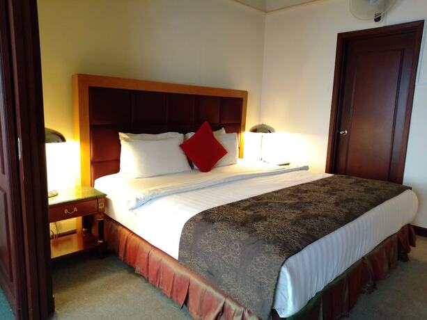 Imagen de la habitación del Hotel Grand Service Apartment At Times Square. Foto 19