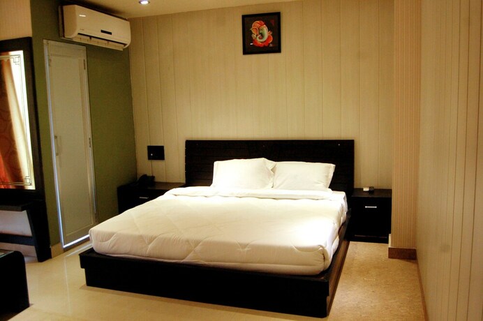Imagen de la habitación del Hotel Grand Shiva. Foto 16