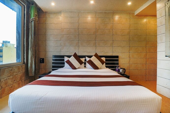 Imagen de la habitación del Hotel Grand Shiva. Foto 18