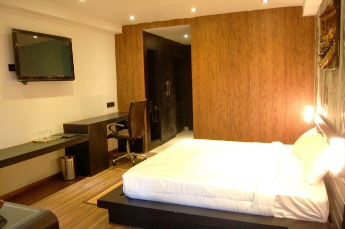Imagen de la habitación del Hotel Grand Shiva. Foto 22