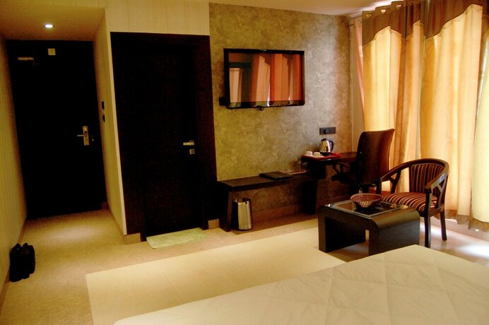 Imagen de la habitación del Hotel Grand Shiva. Foto 25