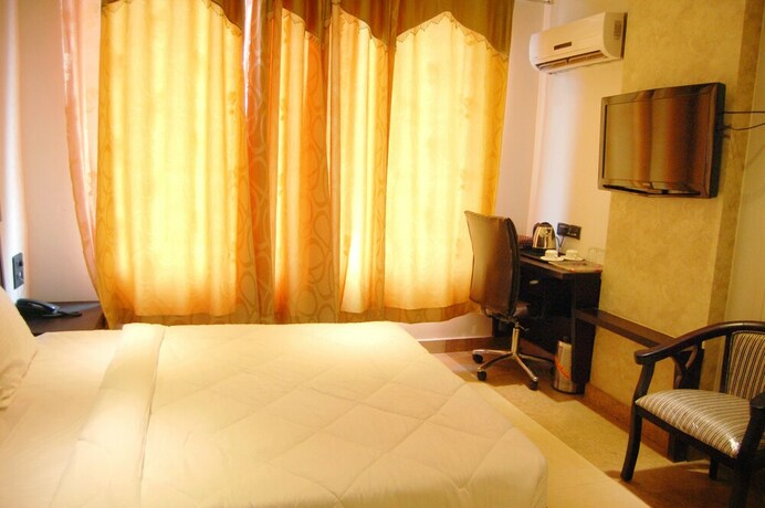 Imagen de la habitación del Hotel Grand Shiva. Foto 27