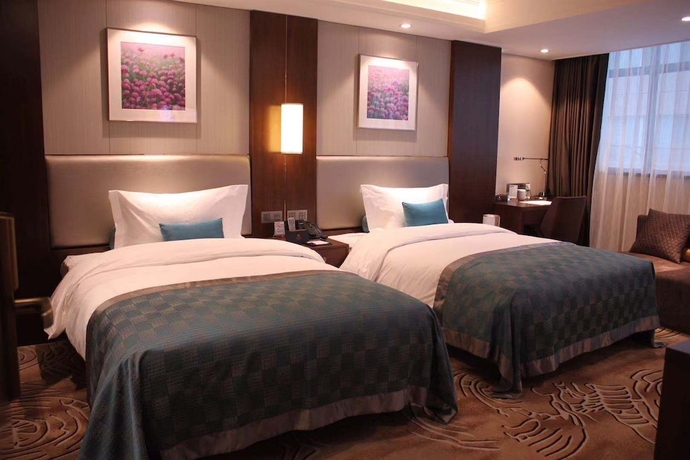 Imagen de la habitación del Hotel Grand Soluxe Hotel Gansu. Foto 15