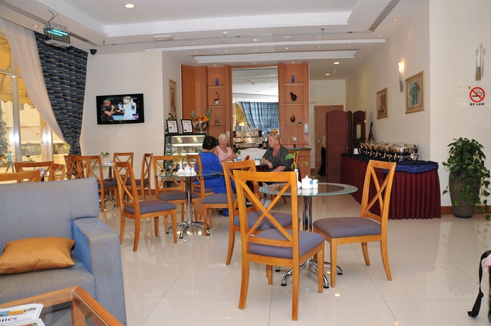 Imagen del bar/restaurante del Hotel Grand Square Stay Apartments. Foto 6