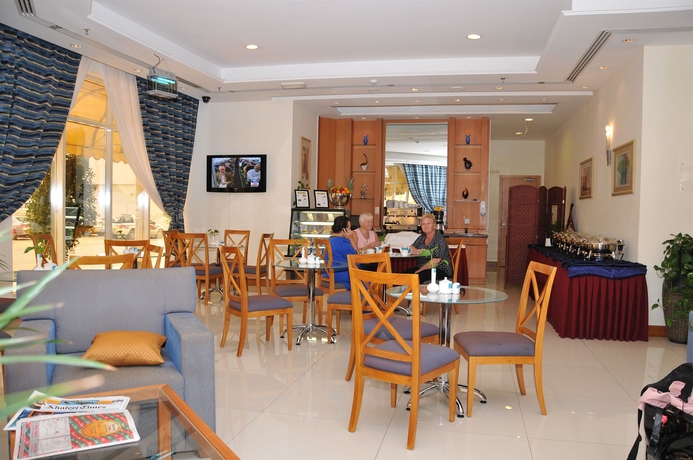 Imagen del bar/restaurante del Hotel Grand Square Stay Apartments. Foto 7