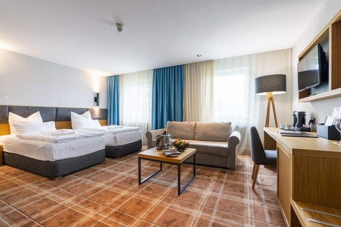 Imagen de la habitación del Hotel Grand Suhl. Foto 15