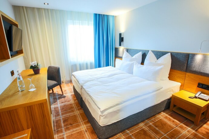 Imagen de la habitación del Hotel Grand Suhl. Foto 28
