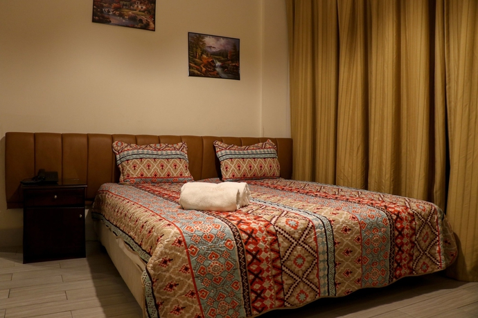 Imagen de la habitación del Hotel Grand Suites. Foto 16