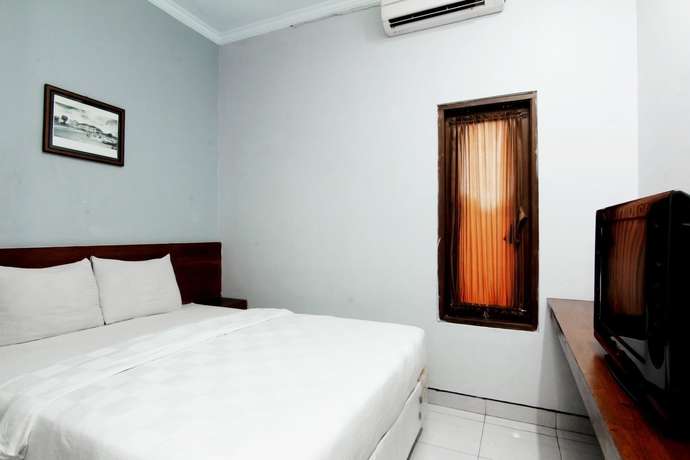 Imagen de la habitación del Hotel Grand Surya Yogyakarta. Foto 11