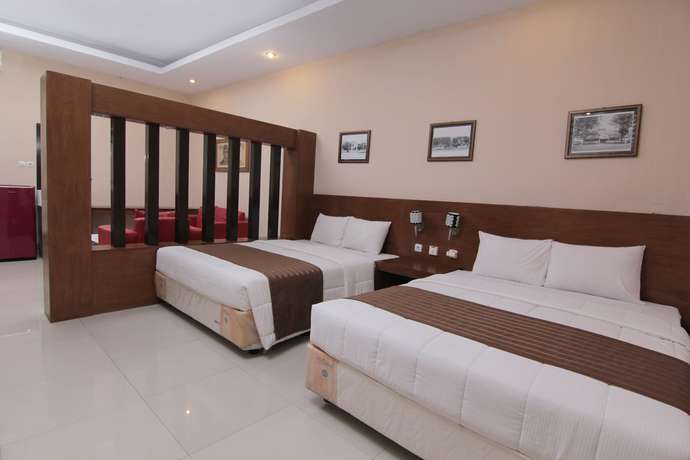 Imagen de la habitación del Hotel Grand Surya Yogyakarta. Foto 16