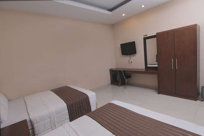 Imagen de la habitación del Hotel Grand Surya Yogyakarta. Foto 17