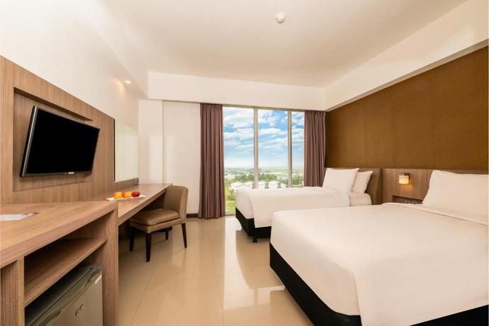 Imagen de la habitación del Hotel Grand Tan Banjarmasin & Convention Center. Foto 5