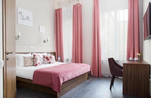 Imagen de la habitación del Hotel Grand Tchaikovsky. Foto 6