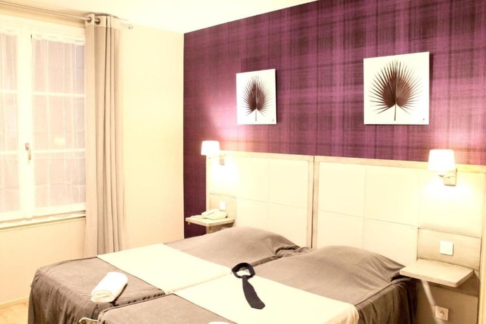 Imagen de la habitación del Hotel Grand Terminus Reine. Foto 15