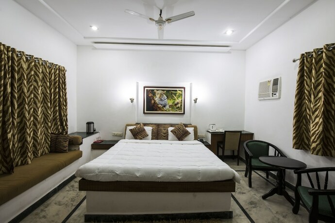 Imagen de la habitación del Hotel Grand Tiger Resort. Foto 19