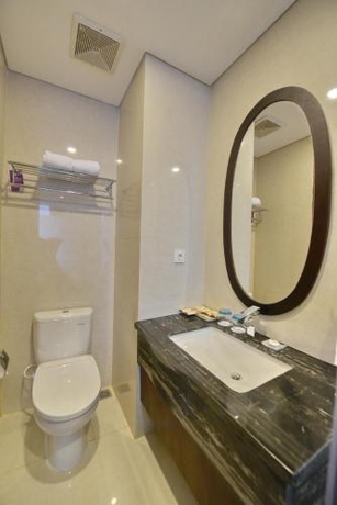 Imagen de la habitación del Hotel Grand Tjokro Balikpapan. Foto 7