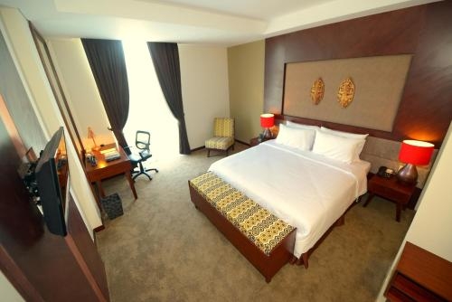 Imagen de la habitación del Hotel Grand Tjokro Balikpapan. Foto 9