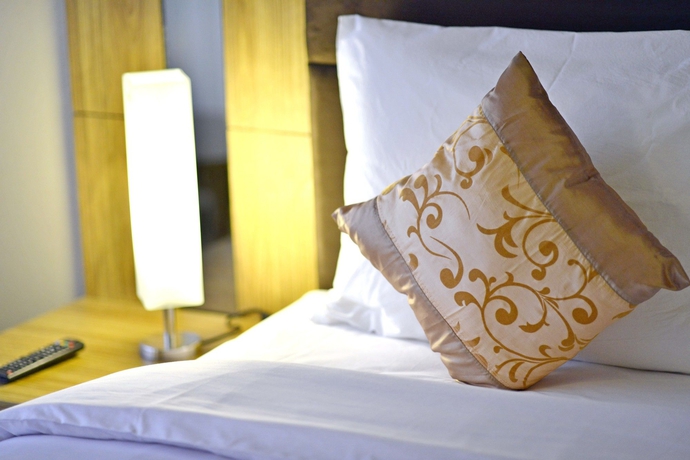 Imagen de la habitación del Hotel Grand Tjokro Jakarta. Foto 7