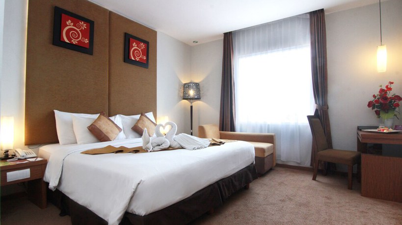 Imagen de la habitación del Hotel Grand Tjokro Yogyakarta. Foto 2
