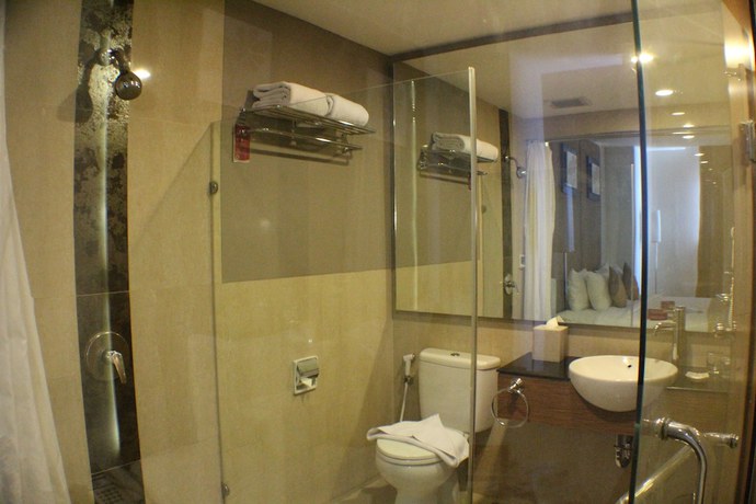 Imagen de la habitación del Hotel Grand Tjokro Yogyakarta. Foto 4