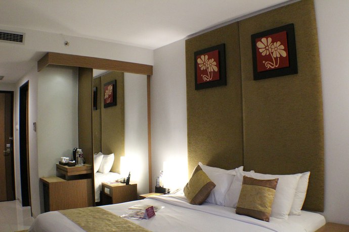 Imagen de la habitación del Hotel Grand Tjokro Yogyakarta. Foto 6