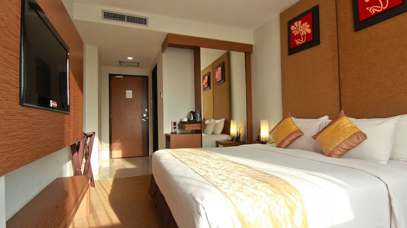 Imagen de la habitación del Hotel Grand Tjokro Yogyakarta. Foto 7