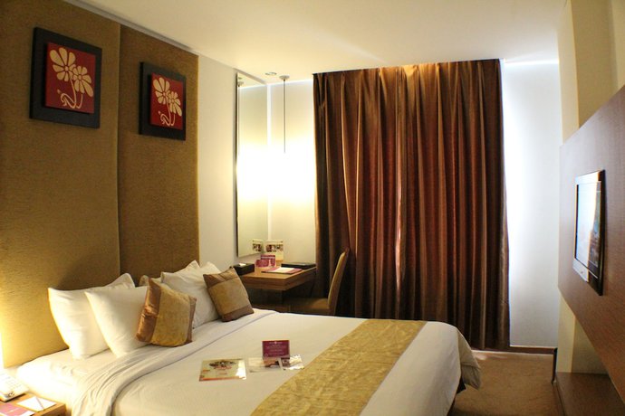 Imagen de la habitación del Hotel Grand Tjokro Yogyakarta. Foto 8