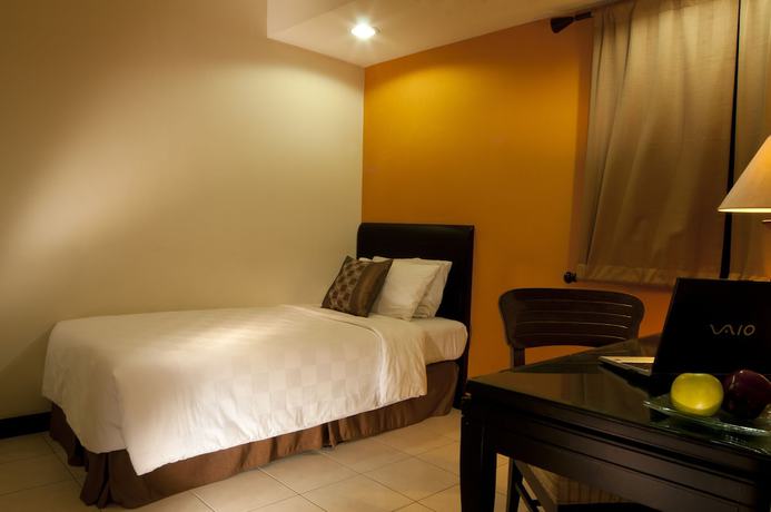 Imagen de la habitación del Hotel Grand Tropic Suites. Foto 3