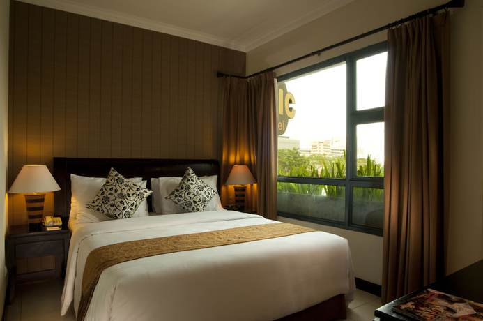 Imagen de la habitación del Hotel Grand Tropic Suites. Foto 8